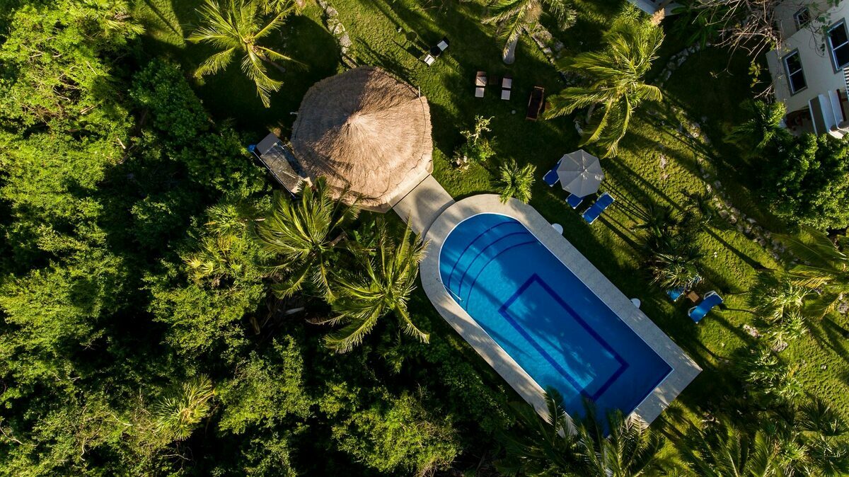 Coco's Villa aerial view of pool and gardens