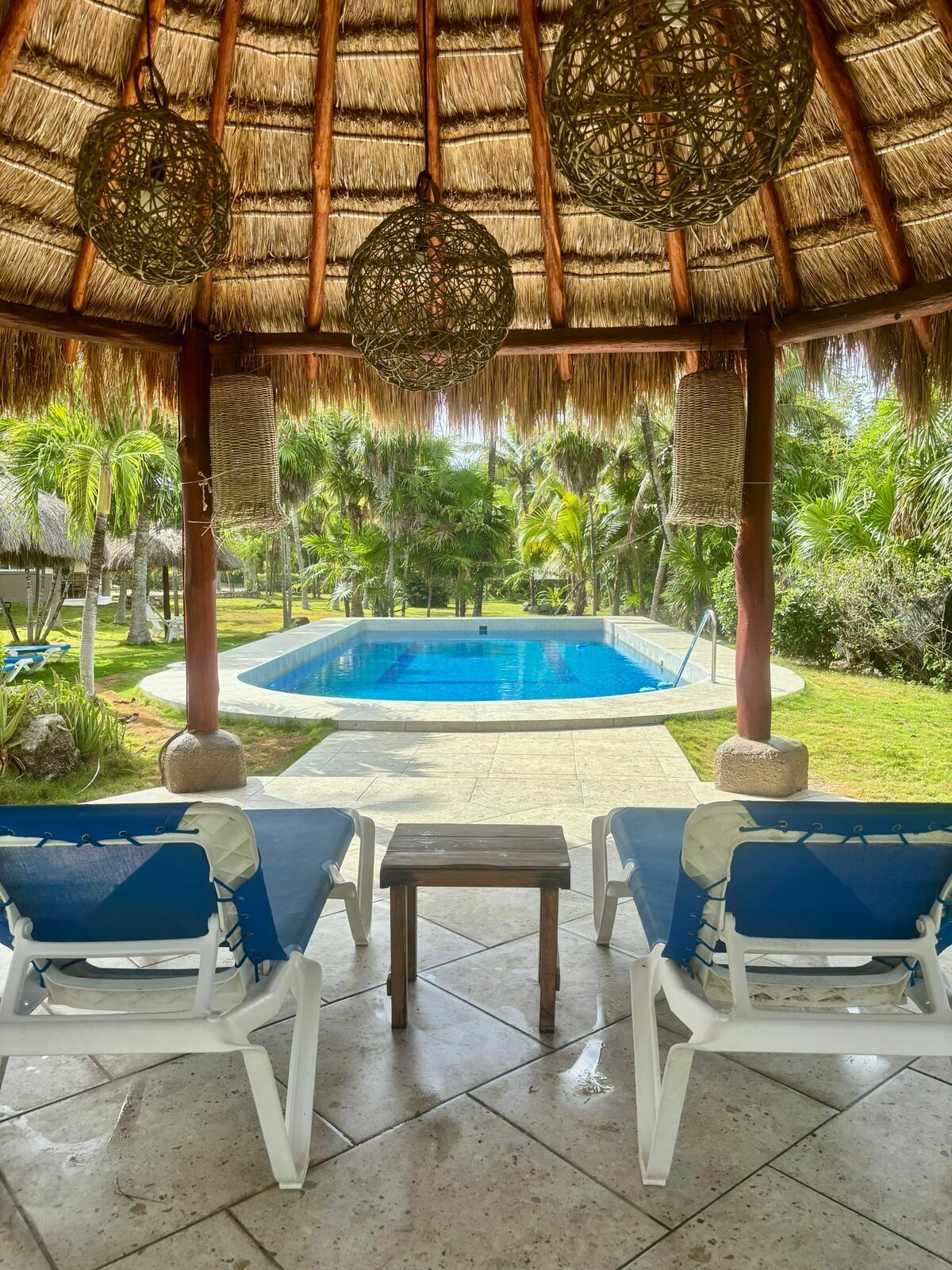 Coco's Villa exterior pool and palapa